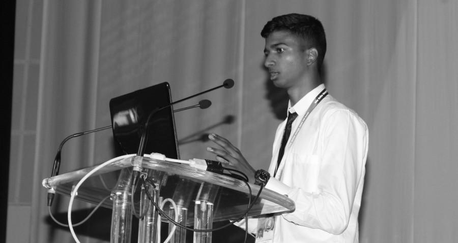 A picture of Pranav Chakkarwar delivering a speech.